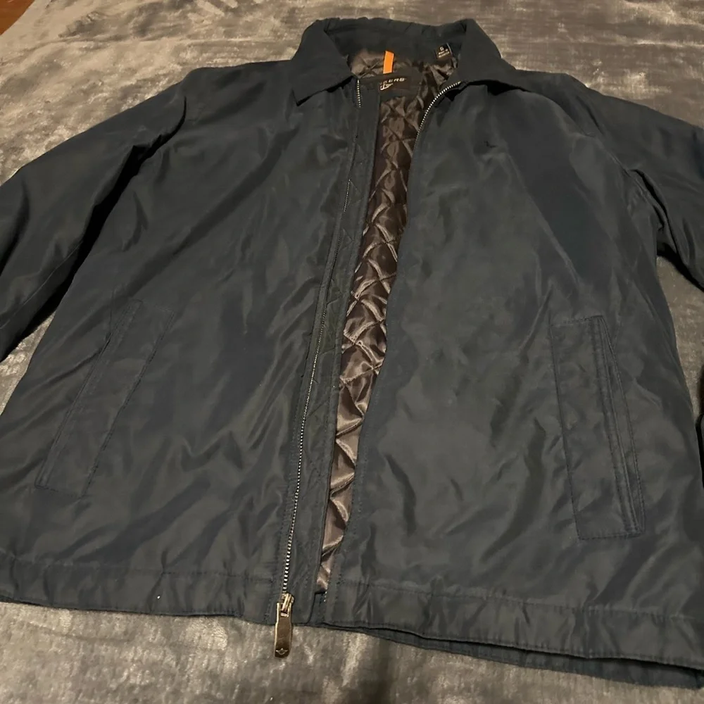 Men’s size small Dockers long sleeve jacket with pockets and neck collar